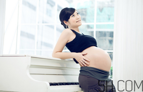 孕晚期肚子疼影響胎兒?jiǎn)?？孕晚期肚子像?lái)月經(jīng)一樣疼